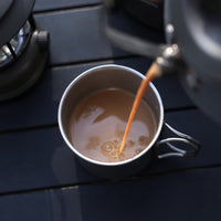 Titan Becher